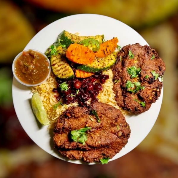 Maza Grill's halal platter with two grilled patties, rice, grilled vegetables, and salsa.